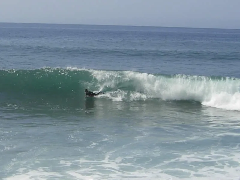 A bodyboarder in the surf at Paul do Mar