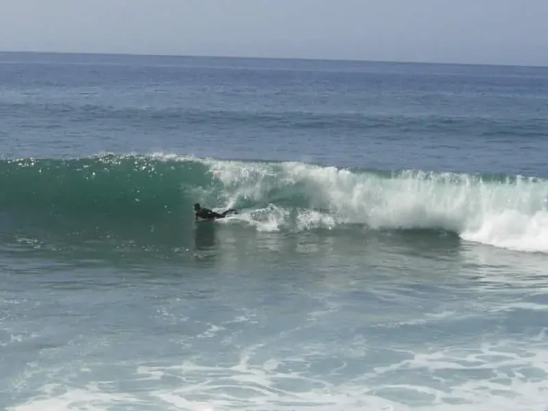 A bodyboarder in the surf at Paul do Mar
